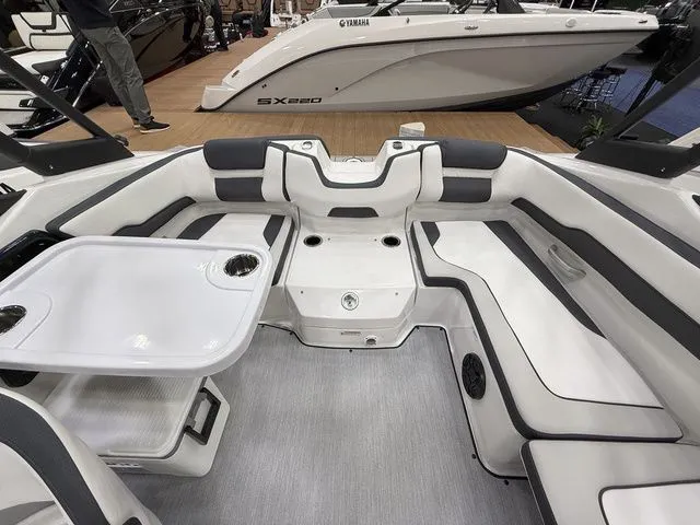 Slide: The Image of Interior of 2025 Yamaha AR195 boat with seating area and table. - 5