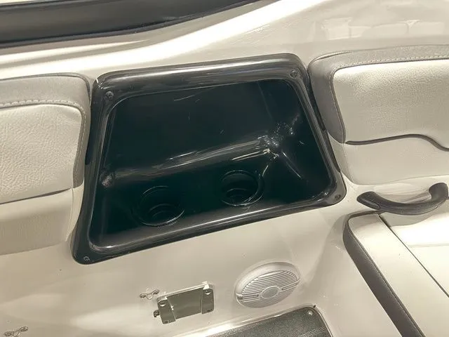 Slide: The Image of 2024 Yamaha SX190 boat interior with cup holders. - 14