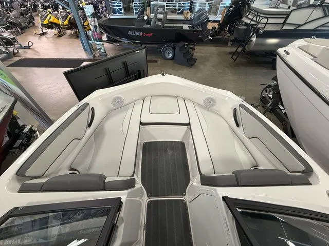Slide: The Image of Interior view of 2024 Yamaha SX190 boat in showroom. - 22