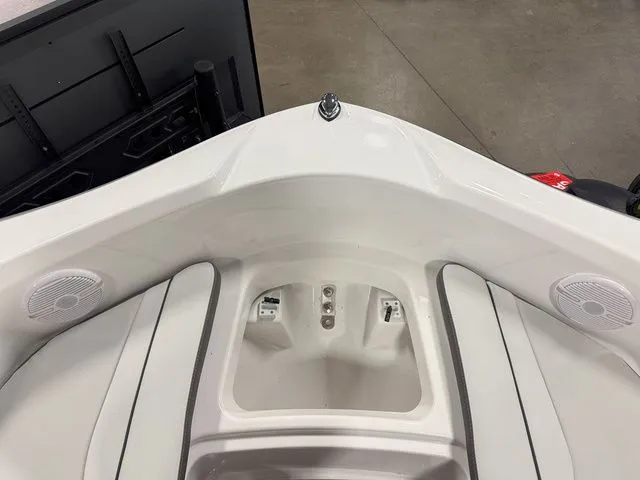 Slide: The Image of Interior view of 2024 Yamaha Boats SX190 with speakers. - 25