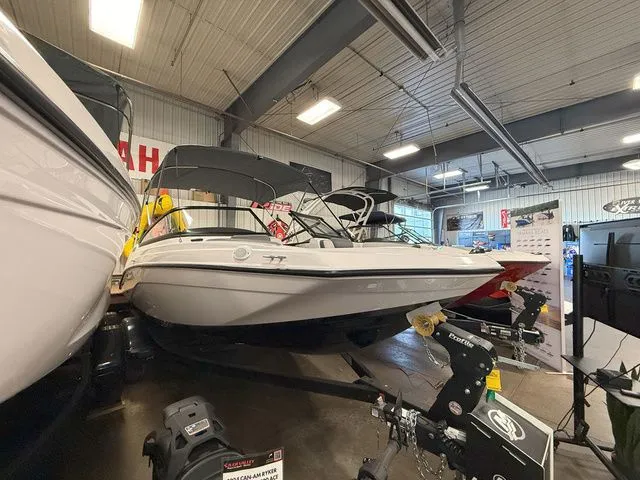 Slide: The Image of 2024 Yamaha Boats SX190 in showroom, sleek design. - 3