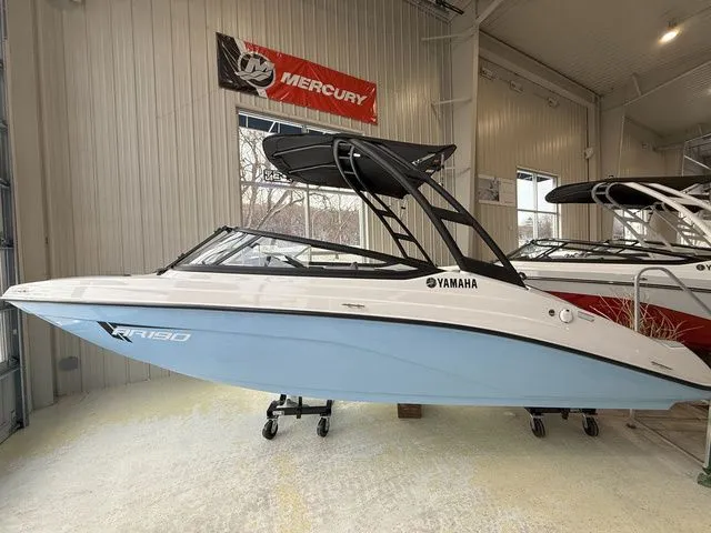 The Image of 2025 Yamaha AR190 boat displayed in a showroom. - 1