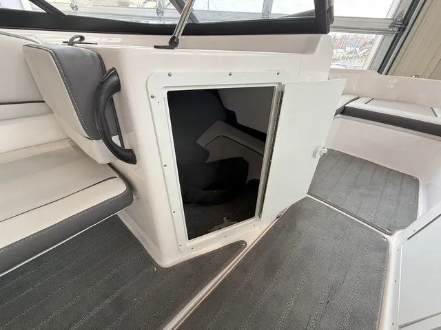 Slide: The Image of Interior of 2025 Yamaha Boats AR190 with storage compartment. - 10