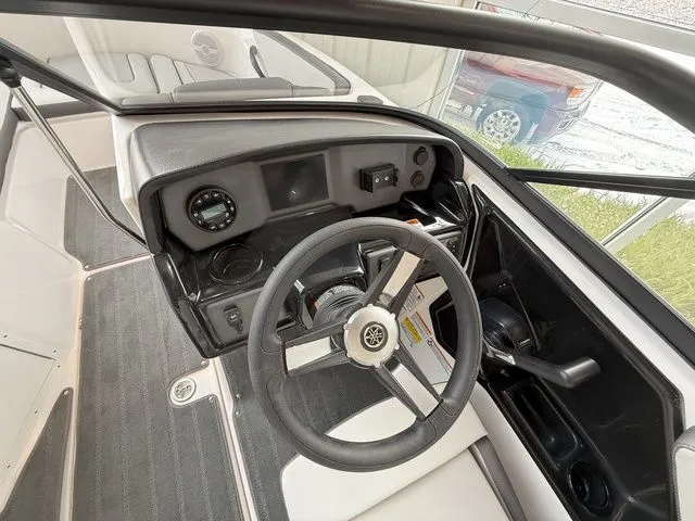 Slide: The Image of Interior view of 2025 Yamaha AR190 boat cockpit with steering wheel. - 13