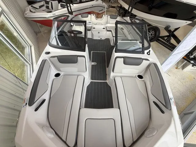 Slide: The Image of Interior view of 2025 Yamaha AR190 boat with gray seating. - 16