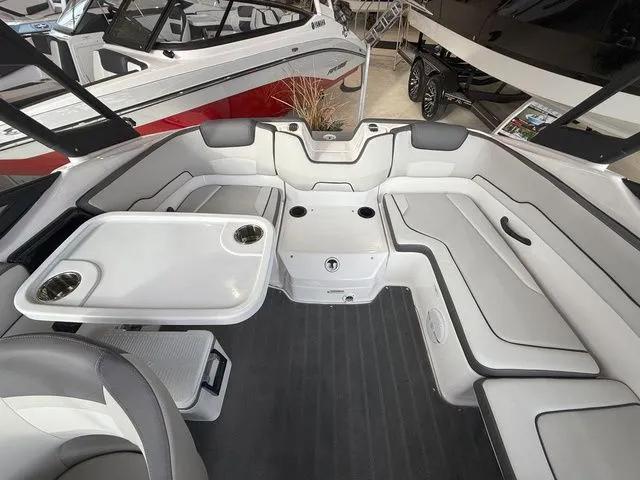 Slide: The Image of Interior of 2025 Yamaha Boats AR190 with seating area and table. - 5