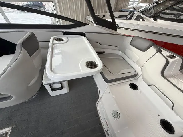 Slide: The Image of Interior of 2025 Yamaha Boats AR190 with table and seating area. - 6