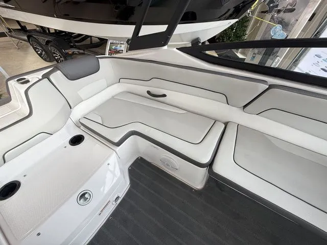 Slide: The Image of Interior of 2025 Yamaha AR190 boat with sleek white seating. - 7