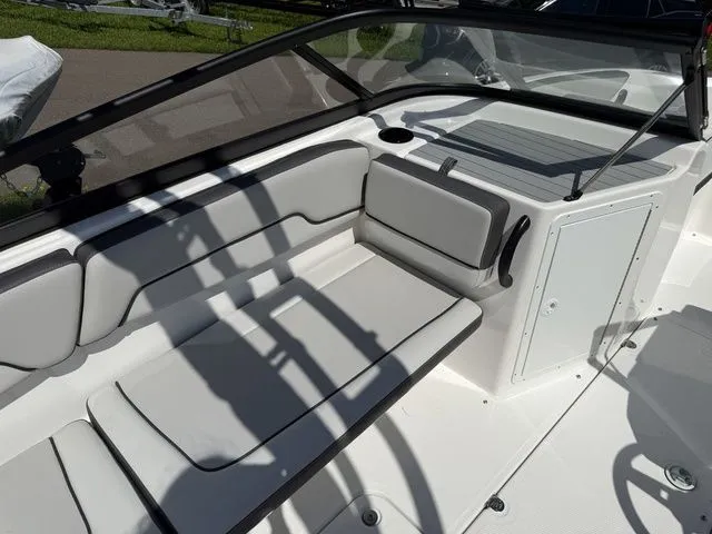 Slide: The Image of Interior of 2025 Yamaha Boats AR190 with white upholstery. - 12