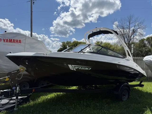 Slide: The Image of 2025 Yamaha AR190 boat on trailer under blue sky. - 3