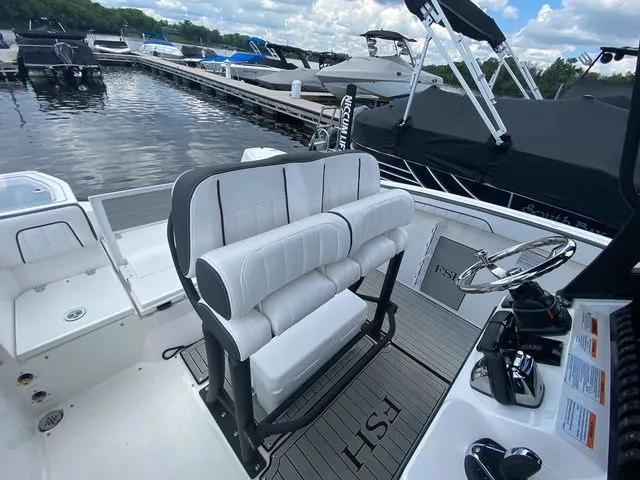 Slide: The Image of 2024 Yamaha Boats 255 FSH Sport H at dock, interior view. - 14