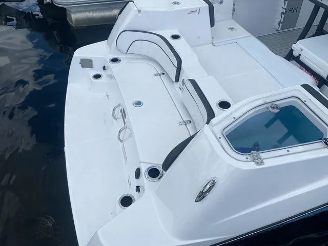 Slide: The Image of Yamaha Boats 2024 255 FSH Sport H with spacious deck and seating area. - 5