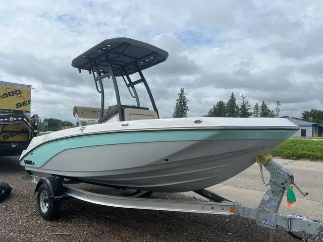 The Image of 2024 Yamaha Boats 190 FSH Sport on trailer, side view. - 1