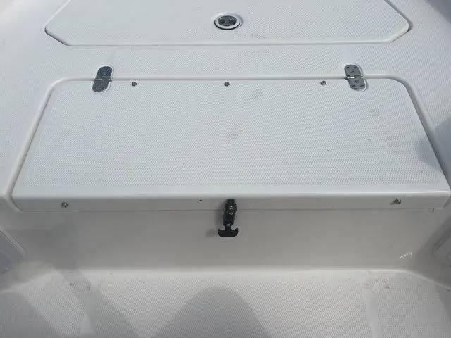 Slide: The Image of Yamaha Boats 2024 190 FSH Sport storage compartment lid. - 20