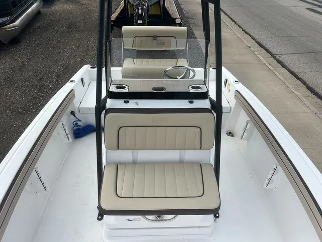 Slide: The Image of Interior view of 2024 Yamaha Boats 190 FSH Sport with bench seating. - 26