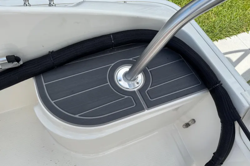 Slide: The Image of Boston Whaler 170 Super Sport 2017 boat detail with stainless steel railing and non-slip deck. - 14