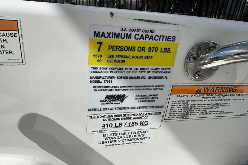 Slide: The Image of 2017 Boston Whaler 170 Super Sport capacity label, showing maximum weight and safety warnings. - 19