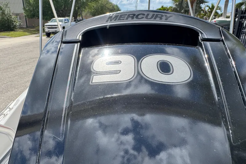 Slide: The Image of Mercury 90 horsepower engine on 2017 Boston Whaler 170 Super Sport boat. - 36