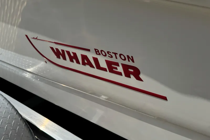 Slide: The Image of Boston Whaler 170 Super Sport 2017 logo on boat hull, close-up view. - 37