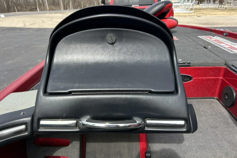 Slide: The Image of 2007 Skeeter 20i boat dashboard with black panel and red accents. - 21