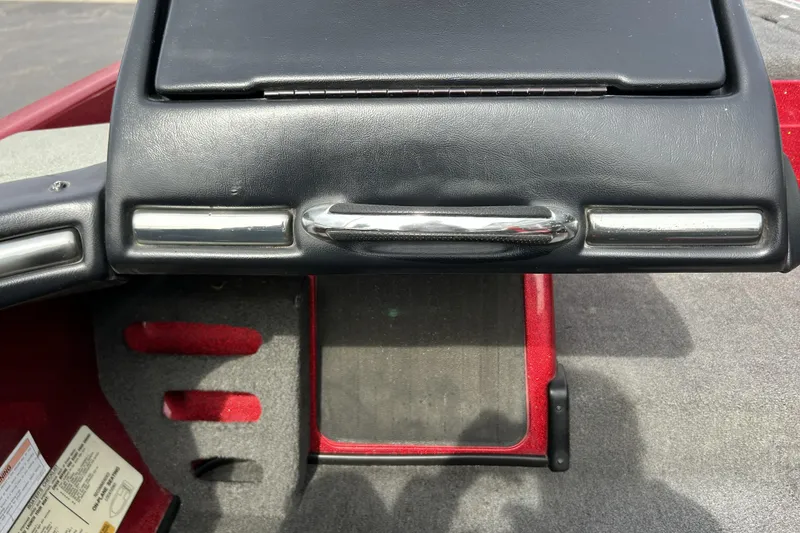 Slide: The Image of 2007 Skeeter 20i boat dashboard with black leather and chrome accents. - 23