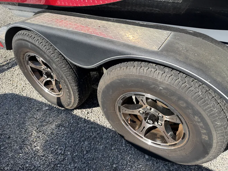 Slide: The Image of Close-up of Nitro Z20 trailer tires, 2021 model, on gravel. - 21