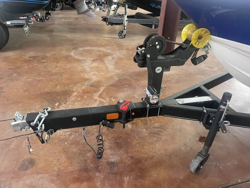 Slide: The Image of Trailer of a 2022 Tahoe 200S boat on concrete floor. - 15