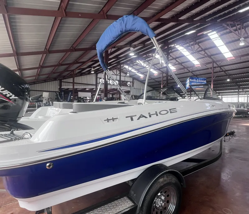 Slide: The Image of 2022 Tahoe 200S boat in a covered storage facility. - 5