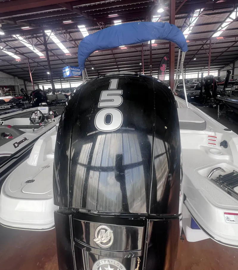 Slide: The Image of 2022 Tahoe 200S boat with 150 HP outboard motor. - 8