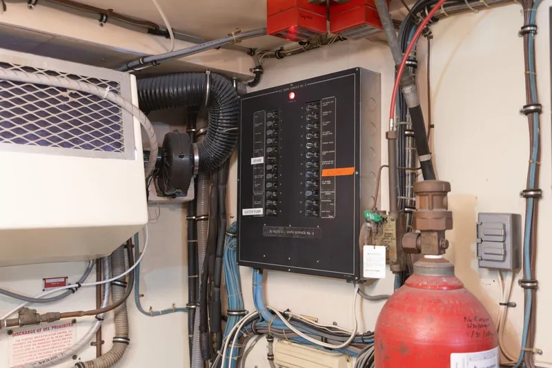 Slide: The Image of Electrical panel and equipment in 1986 Hatteras 63 Motor Yacht engine room. - 111