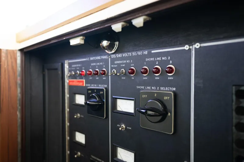 Slide: The Image of Electrical control panel on a 1986 Hatteras 63 Motor Yacht. - 127