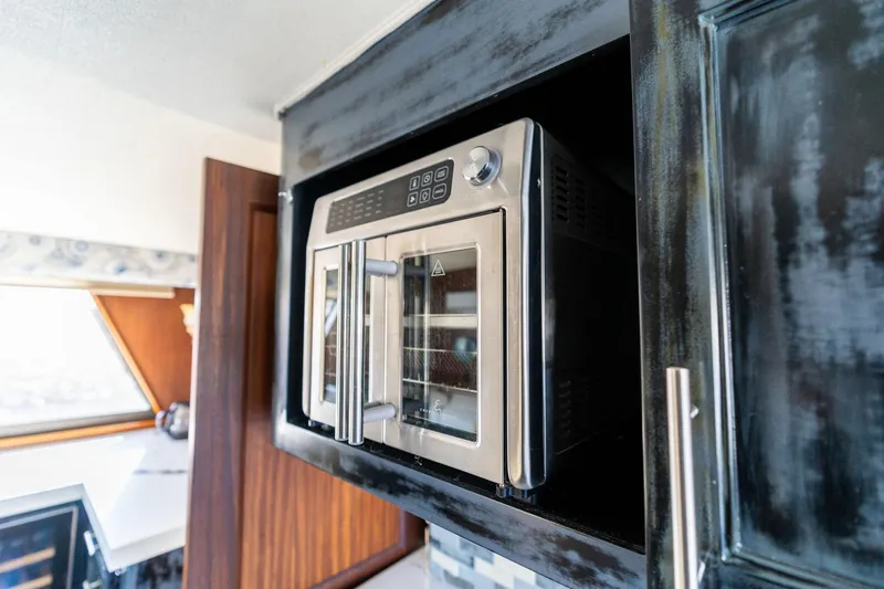 Slide: The Image of Built-in microwave in 1986 Hatteras 63 Motor Yacht kitchen area. - 20