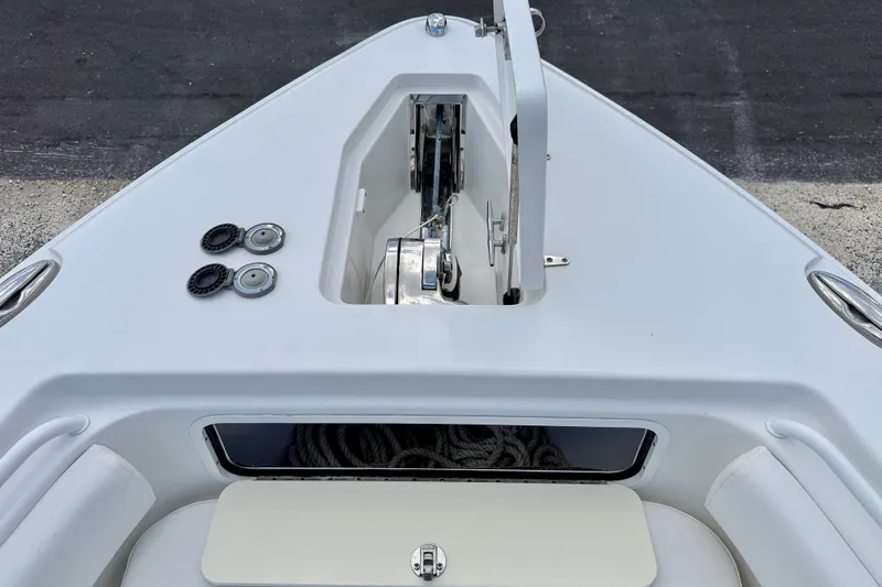 Slide: The Image of Bow view of 2018 Sea Hunt Gamefish 27 with anchor storage and fittings. - 10