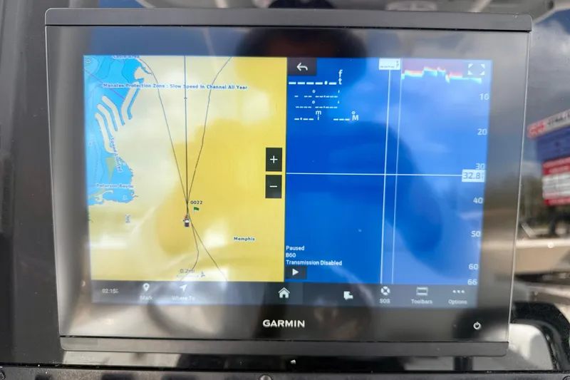 Slide: The Image of Garmin navigation display on 2018 Sea Hunt Gamefish 27 boat, showing map and sonar data. - 22