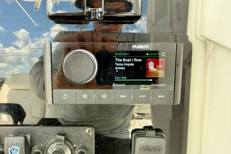 Slide: The Image of Fusion stereo system on 2018 Sea Hunt Gamefish 27 boat dashboard. - 23