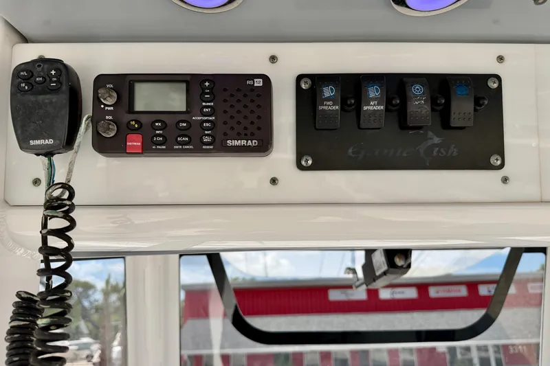 Slide: The Image of Control panel of a 2018 Sea Hunt Gamefish 27 boat with Simrad radio. - 25