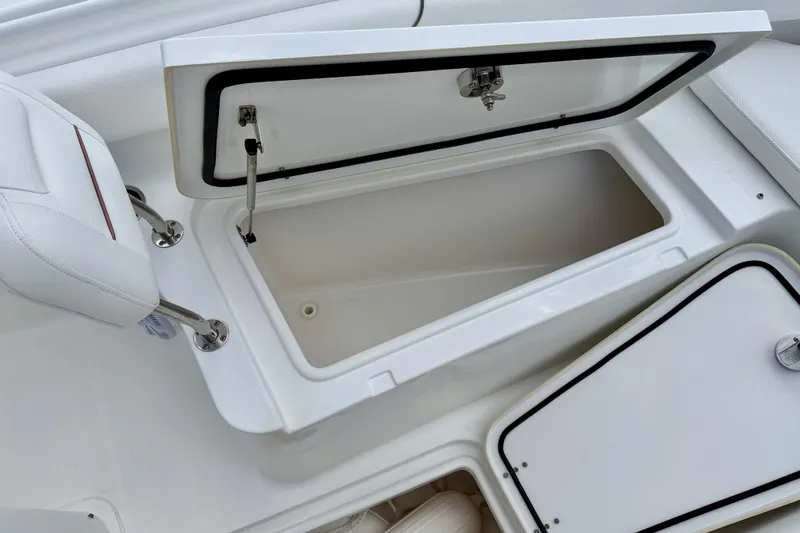 Slide: The Image of Open storage compartment on a 2018 Sea Hunt Gamefish 27 boat. - 38
