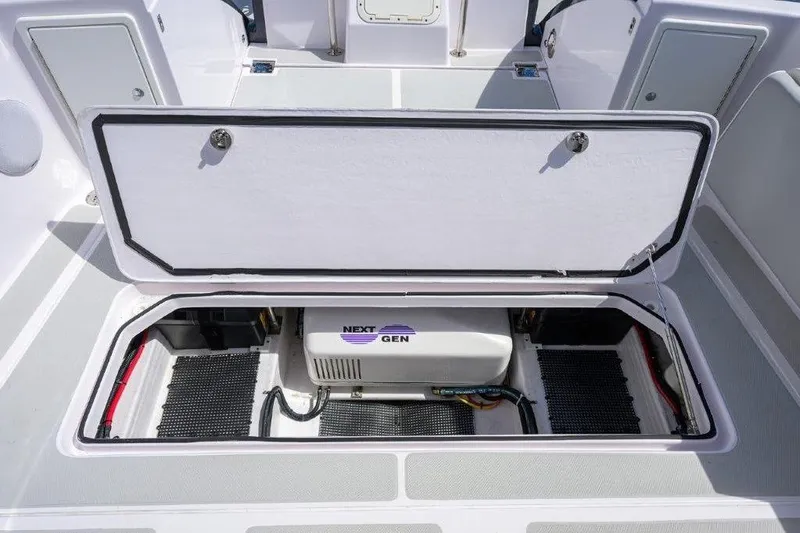 Slide: The Image of Open hatch on 2022 True North 34 boat revealing Next Gen generator. - 27