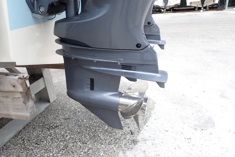 Slide: The Image of Outboard motor of 2016 Grady-White Freedom 275 boat on display. - 107