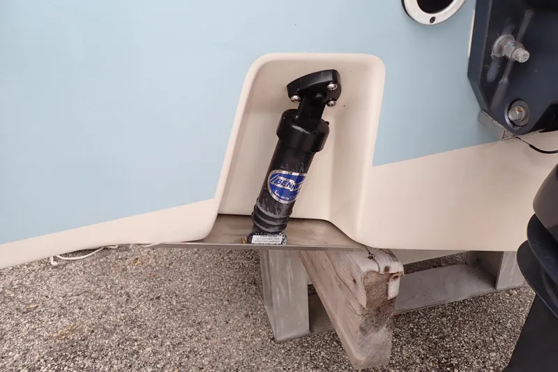 Slide: The Image of 2016 Grady-White Freedom 275 boat detail showing trim tab mechanism. - 108