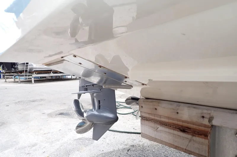 Slide: The Image of 2016 Grady-White Freedom 275 boat propeller and hull detail on dry dock. - 131