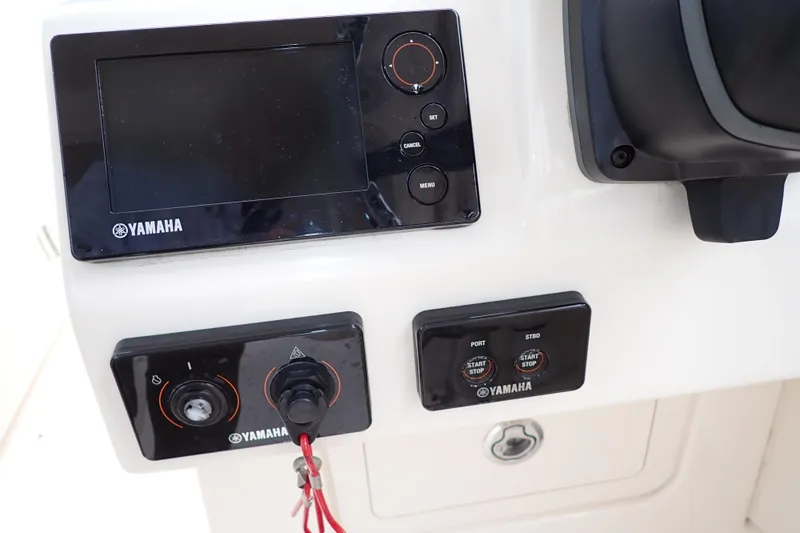 Slide: The Image of Control panel of a 2016 Grady-White Freedom 275 boat with Yamaha components. - 15