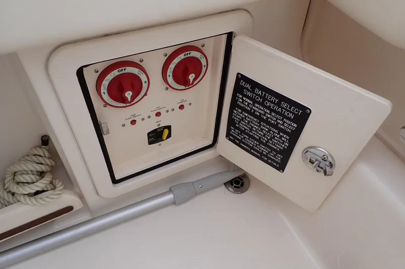 Slide: The Image of 2016 Grady-White Freedom 275 dual battery switch panel with operation instructions. - 34