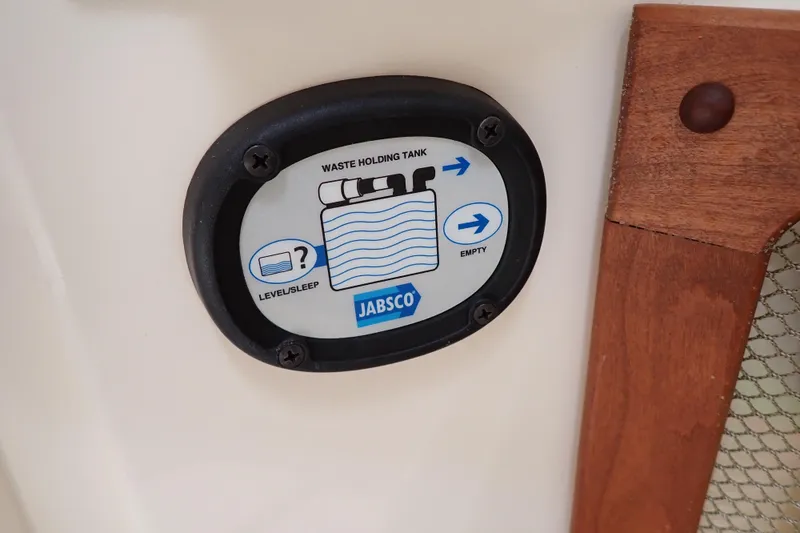 Slide: The Image of Waste holding tank indicator on 2016 Grady-White Freedom 275 boat. - 47