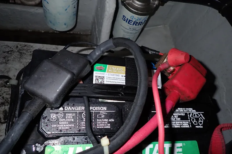 Slide: The Image of Battery and wiring inside a 2016 Grady-White Freedom 275 boat. - 81
