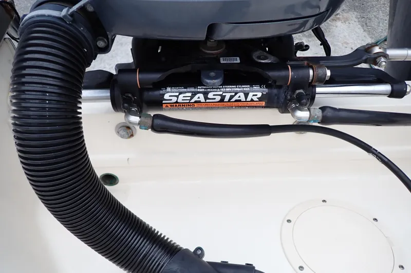 Slide: The Image of SeaStar hydraulic steering system on 2016 Grady-White Freedom 275 boat. - 92