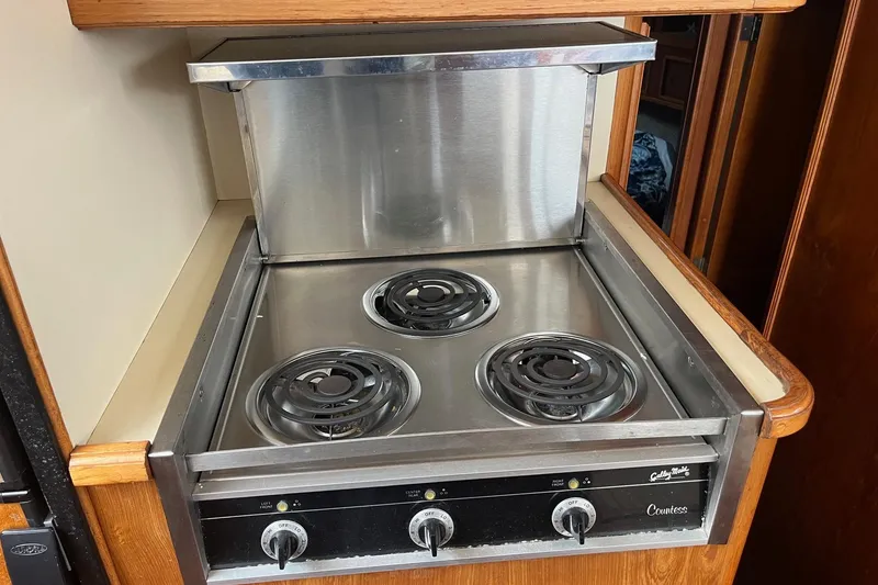Slide: The Image of Electric stove in 1989 Egg Harbor 41 Convertible yacht kitchen. - 17