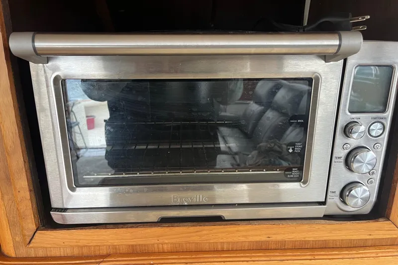 Slide: The Image of Breville toaster oven inside 1989 Egg Harbor 41 Convertible boat kitchen. - 19