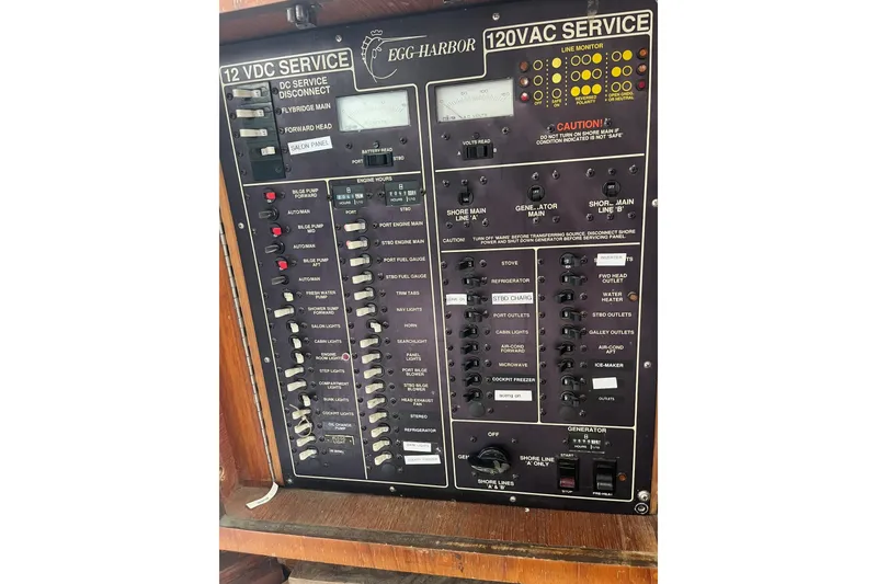 Slide: The Image of Electrical control panel of a 1989 Egg Harbor 41 Convertible boat. - 23
