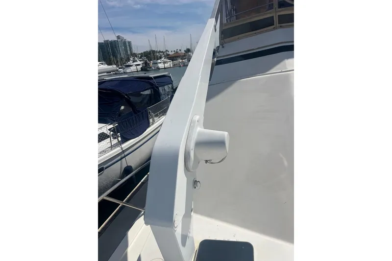 Slide: The Image of 1989 Egg Harbor 41 Convertible yacht deck with marina view. - 28
